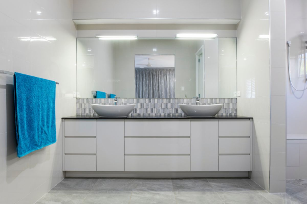 White PVC wall cladding panels in Irish bathroom — waterproof, grout-free finish